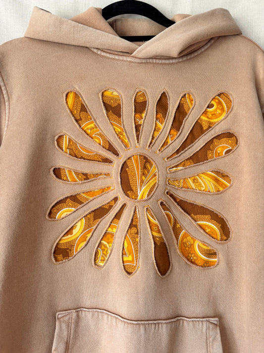 Close up of reverse applique detail on upcycled camel beige Gap hoodie