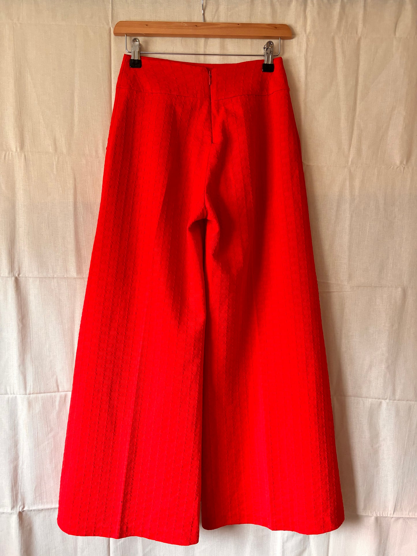 Back view of red 1960s/70s high-waisted flare