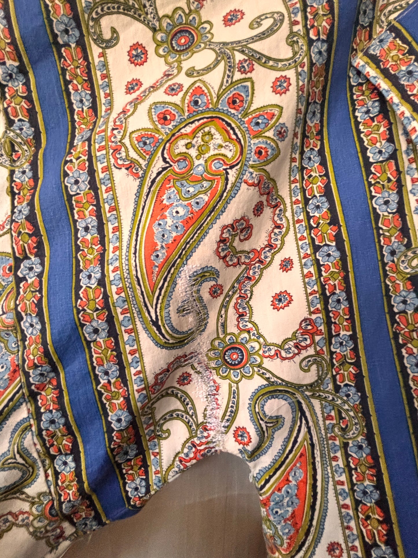 close up of mend around arm hole