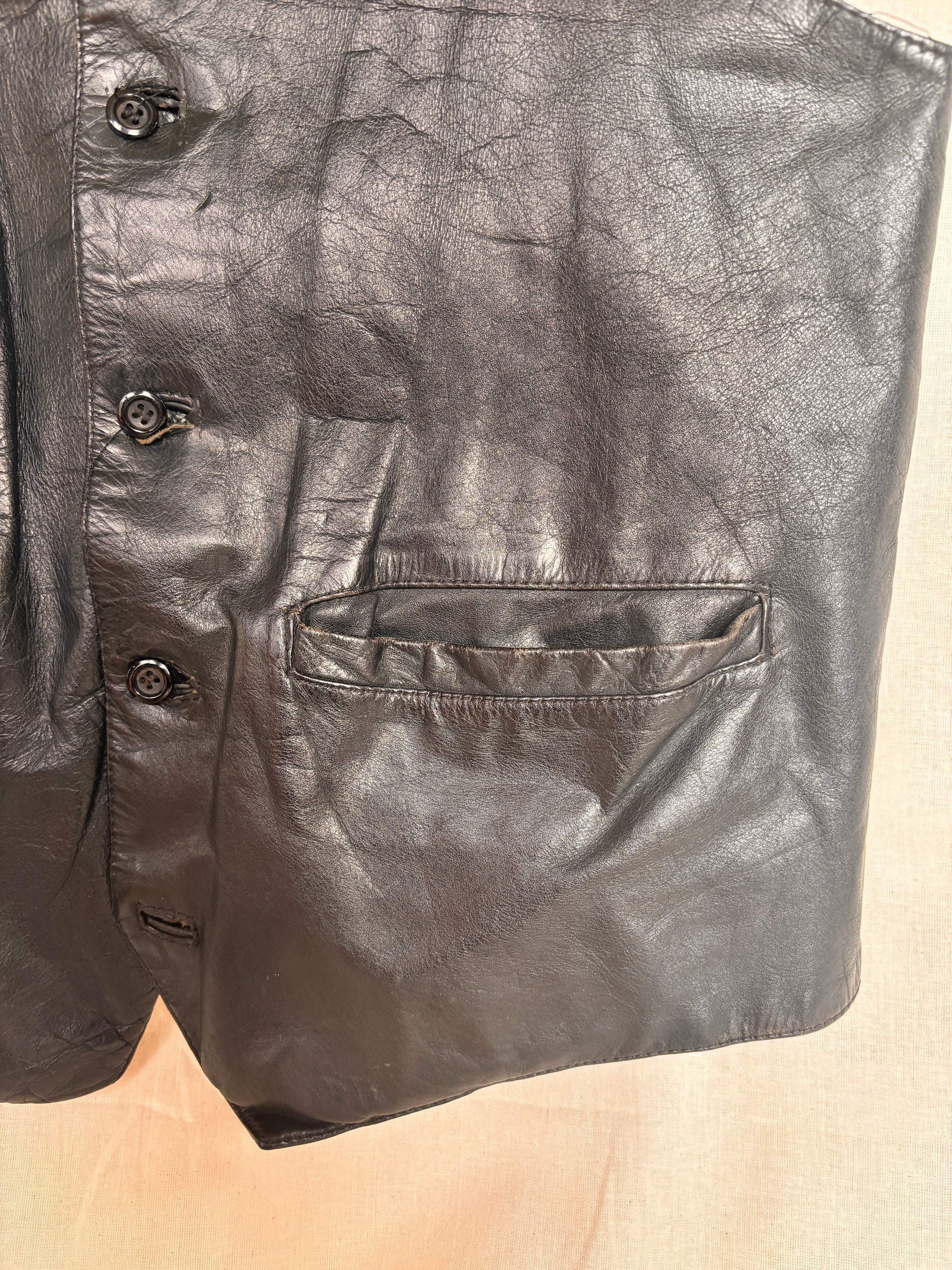close up of pocket of Vintage 1980s Black Leather Waistcoat Vest
