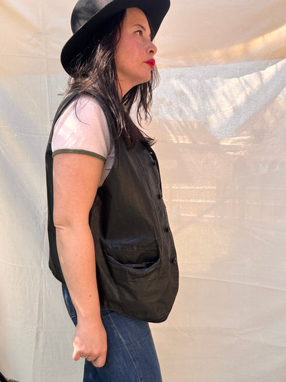 side view of Vintage 1980s Black Leather Waistcoat Vest on model