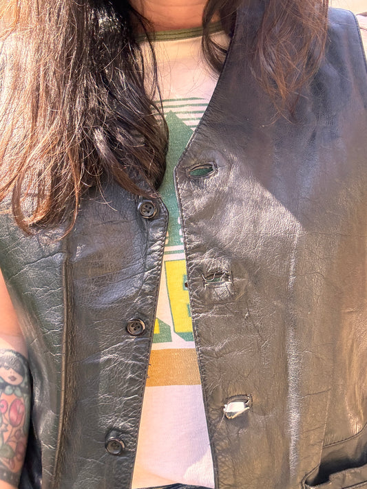 close-up of Vintage 1980s Black Leather Waistcoat Vest