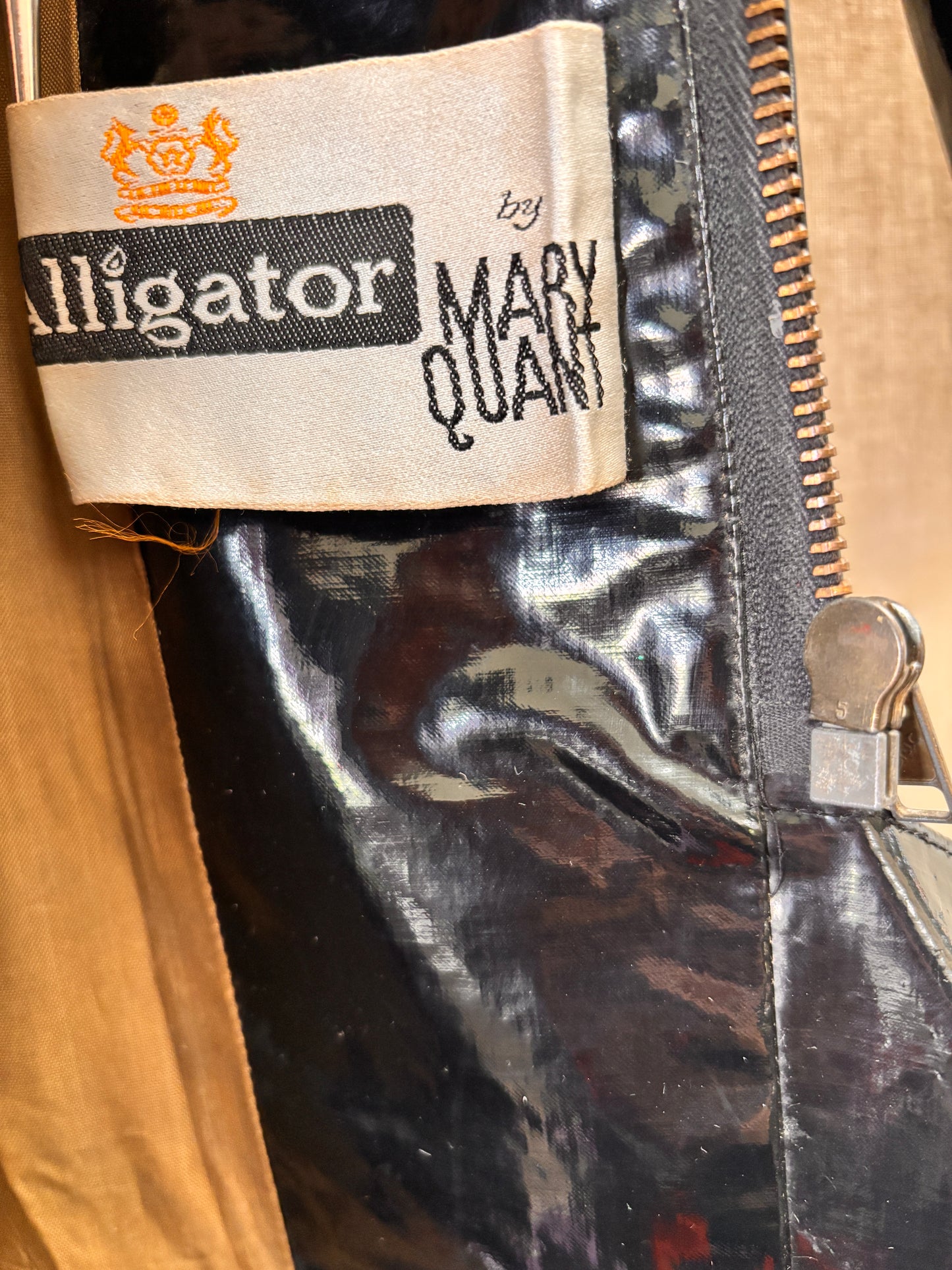 close up of label of 1960s Mary Quant Black PVC Vinyl Raincoat | Mod Vintage Coat