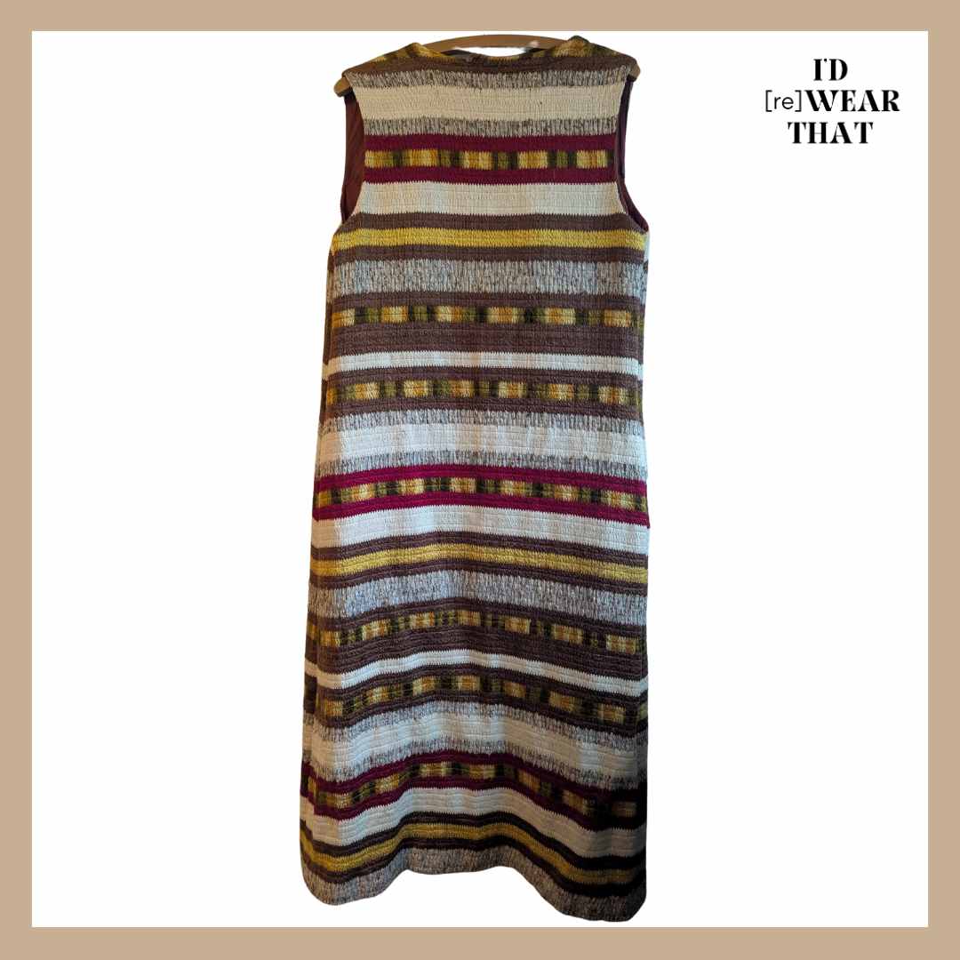 Back view of of vintage 1970s sleeveless duster waistcoat